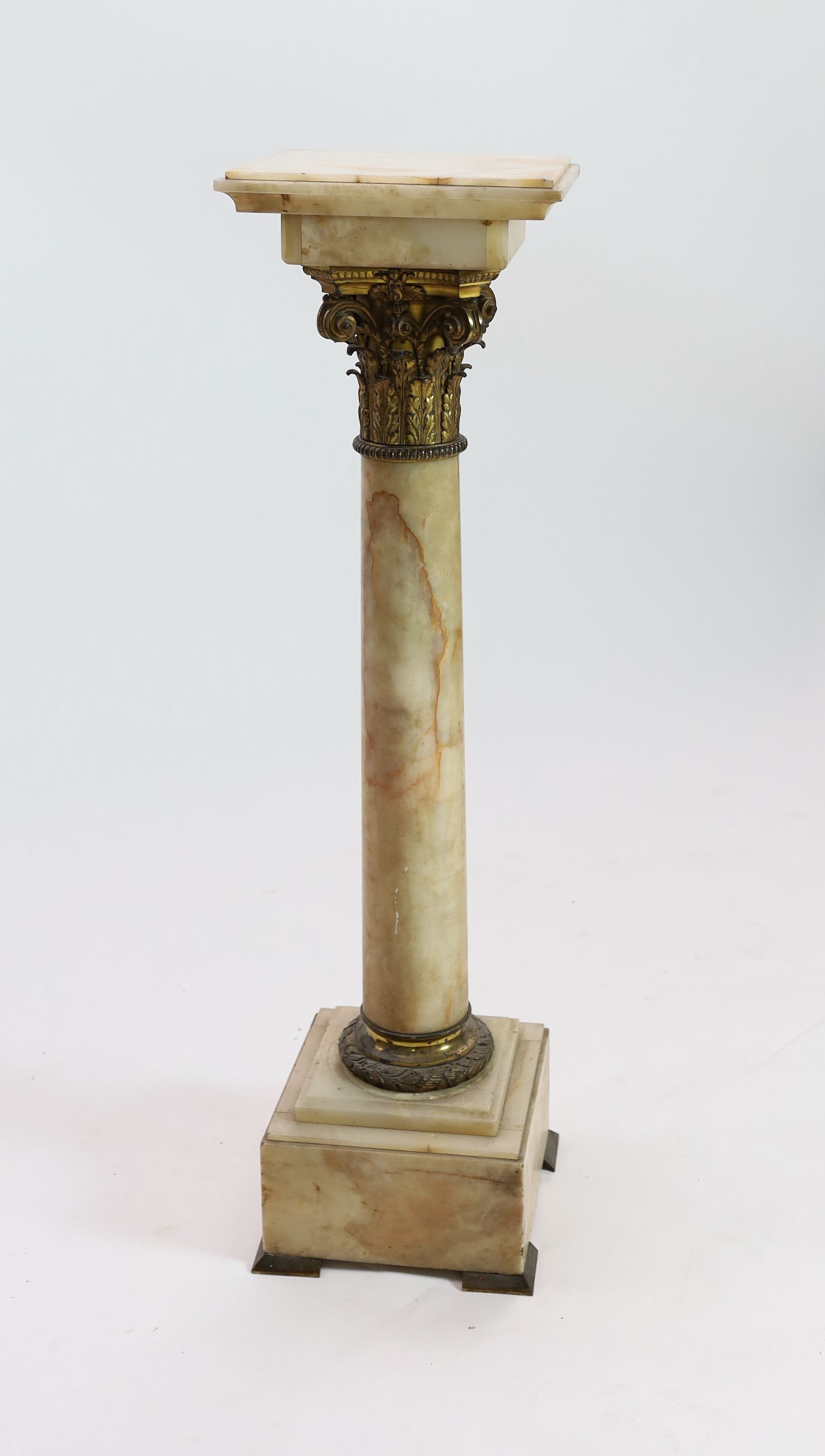 An Edwardian ormolu mounted onyx pedestal, W,32cm H.117cm